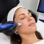 Licensed esthetician performing SkinPen Precision microneedling treatment at Cool Springs Plastic Surgery in Brentwood, TN
