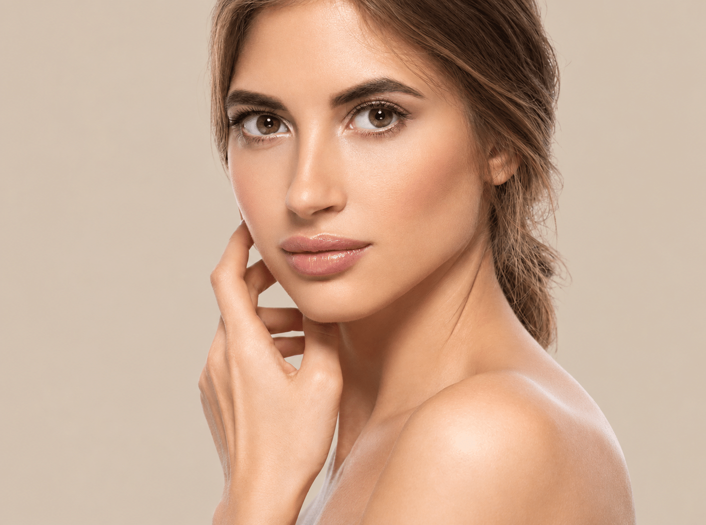 Beautiful woman has healthy glowing skin with cosmetic treatments.